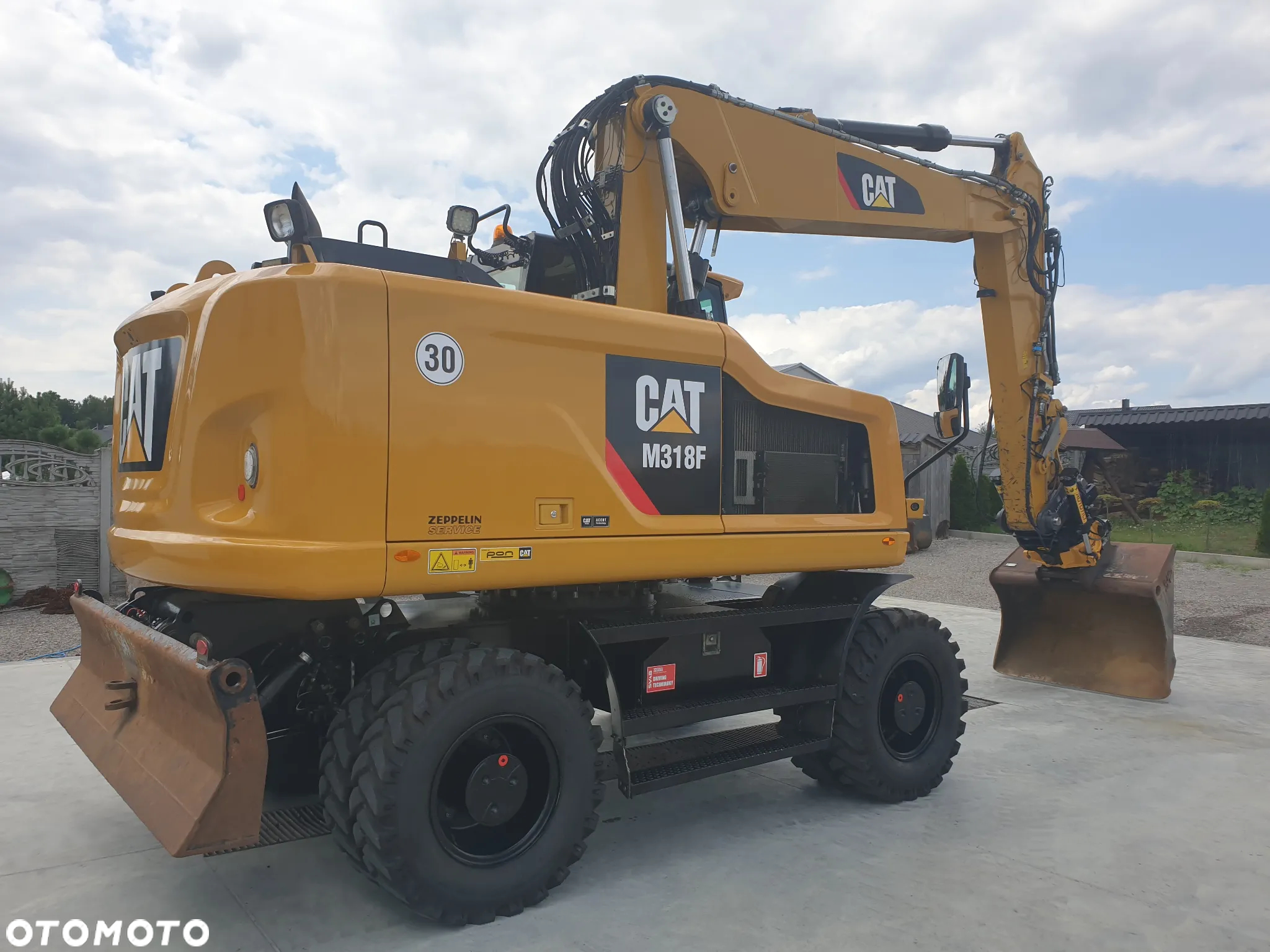 Caterpillar M 318 F ROTOTILT SPROWADZONY ŁADNY STAN - 6