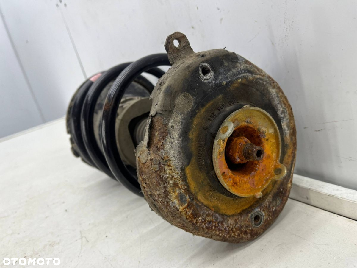 Amortyzator Renault Scenic 1 I 96-03r BENZYNA przedni PRAWY LEWY mcpherson sprężyna przód 7700430760 - 7