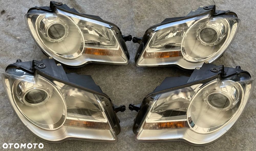 VW Touran 1T Lift reflektor prawy lewy zwykły lampa przód komplet