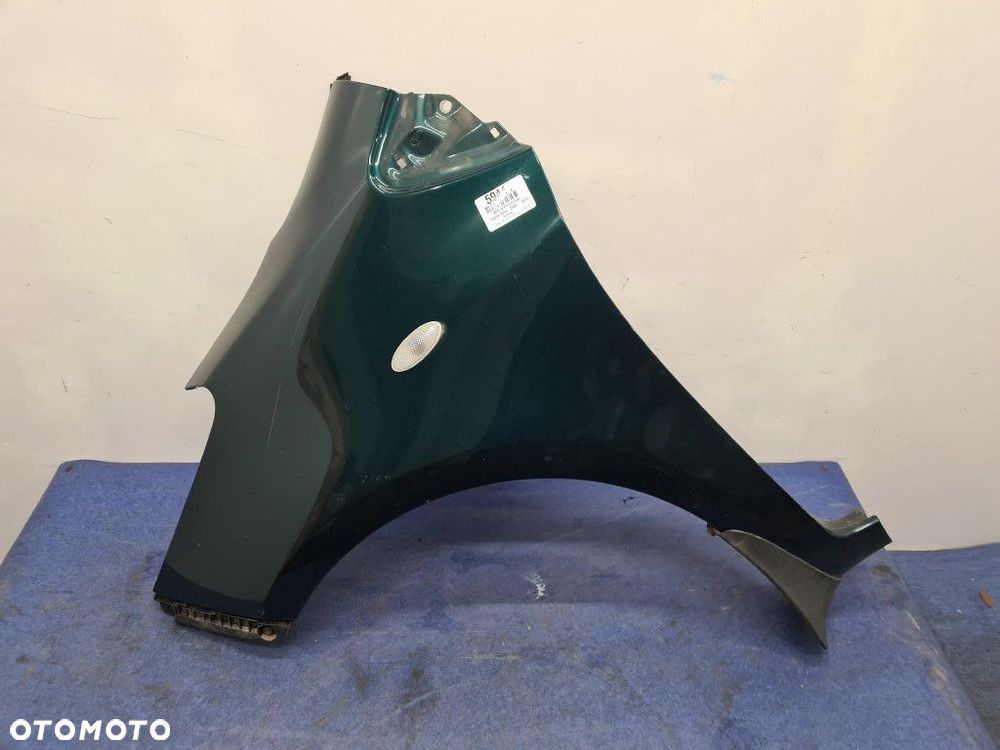TOYOTA YARIS II LIFT BŁOTNIK PRZÓD LEWY 6S3 - 1