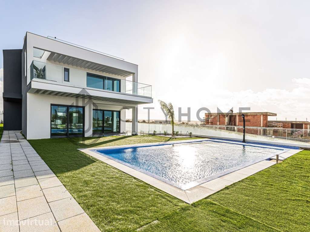 Moradia T4 isolada com piscina, cave e vista mar - Grande imagem: 4/52