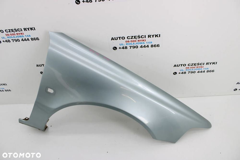 Volvo V40 lift Błotnik Prawy Przód 352-22 - 1