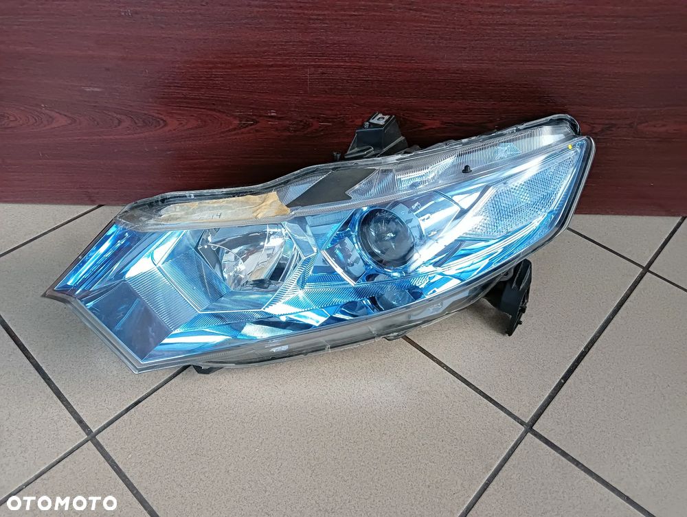 Honda Insight lift lewy reflektor lampa przednia Europa - 1