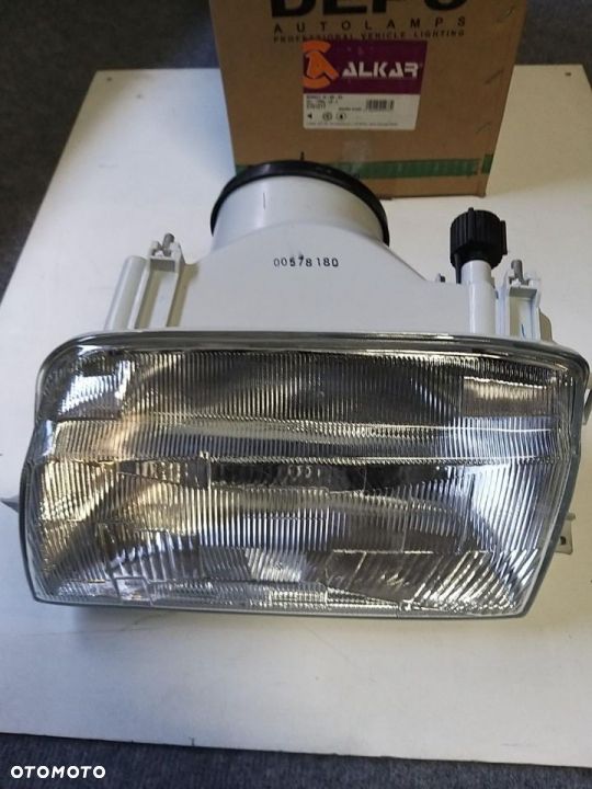 REFLEKTOR   RENAULT 19 88-96 H4 -05/92 REGULACJA MANUALNA LEWA  strona 2701217 7701033626 - 3