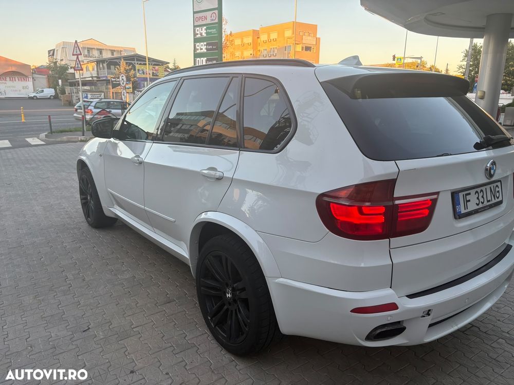 BMW X5 2011 — imagine 12