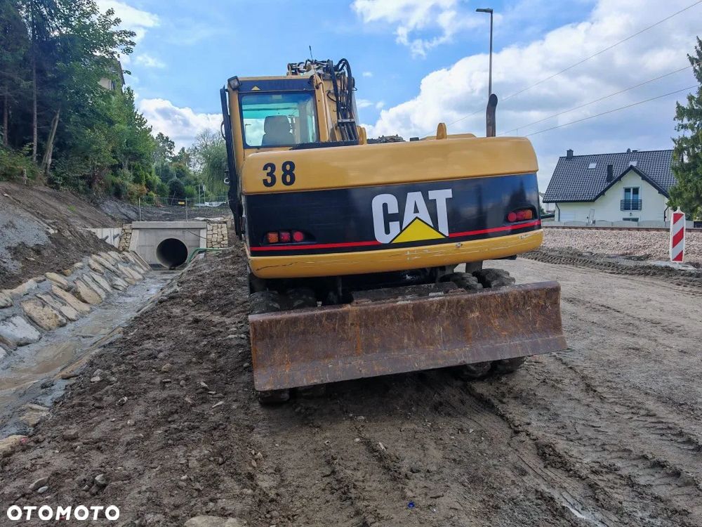 Caterpillar M316C - 3