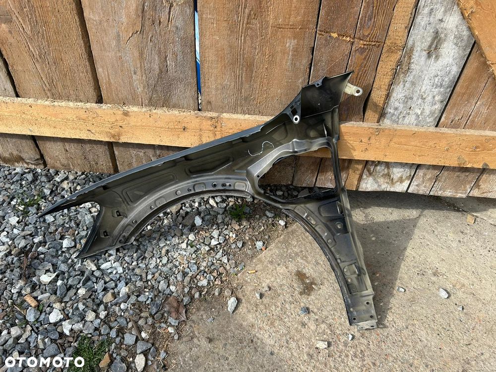 BŁOTNIK PRAWY PRZÓD AUDI E-TRON 4KE - 4