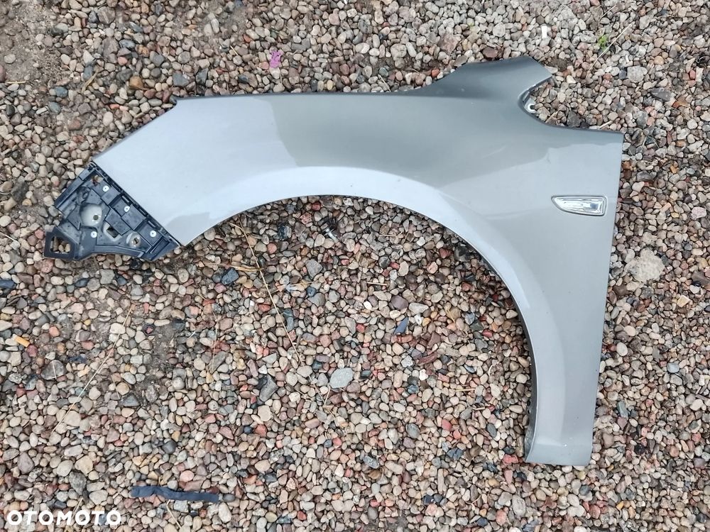 OPEL ASTRA J IV  LIFT 2016R BŁOTNIK PRZEDNI LEWY Z41W