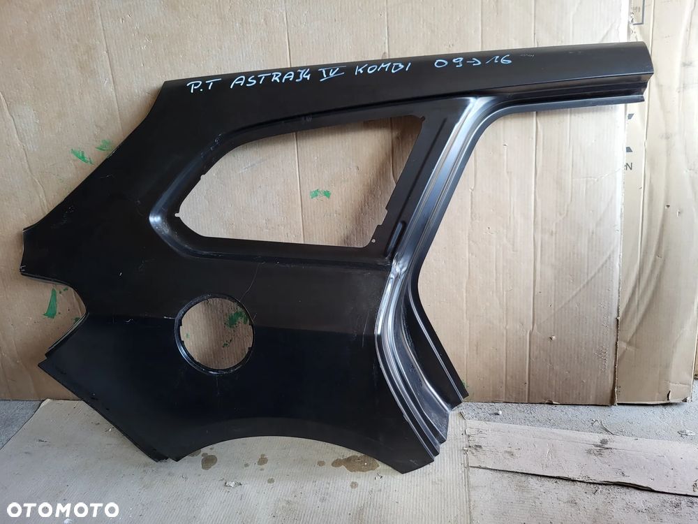 BŁOTNIK PRAWY TYŁ ASTRA J IV 4 KOMBI - 1