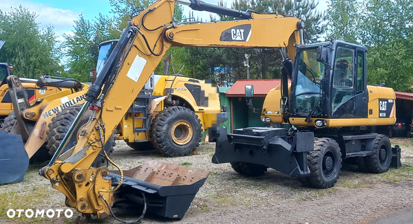 Caterpillar M315D 2010r podpory skarpowka 3 x składane ramie