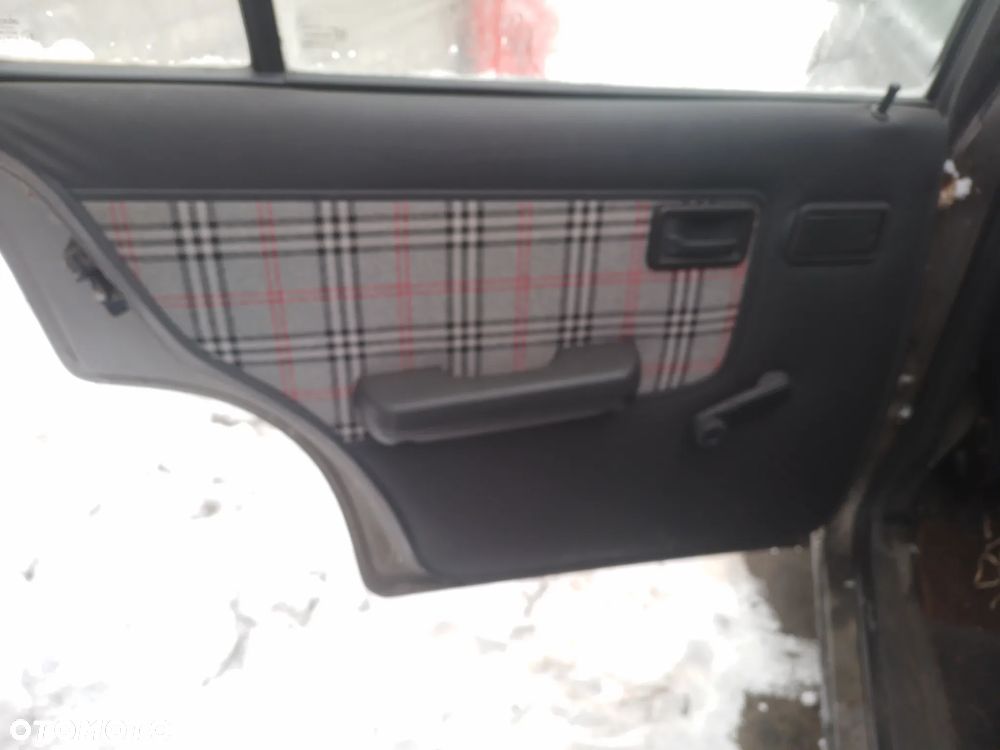 OPEL KADETT E LIFT 89-91    FELGI STALOWE KOMPLET - 31
