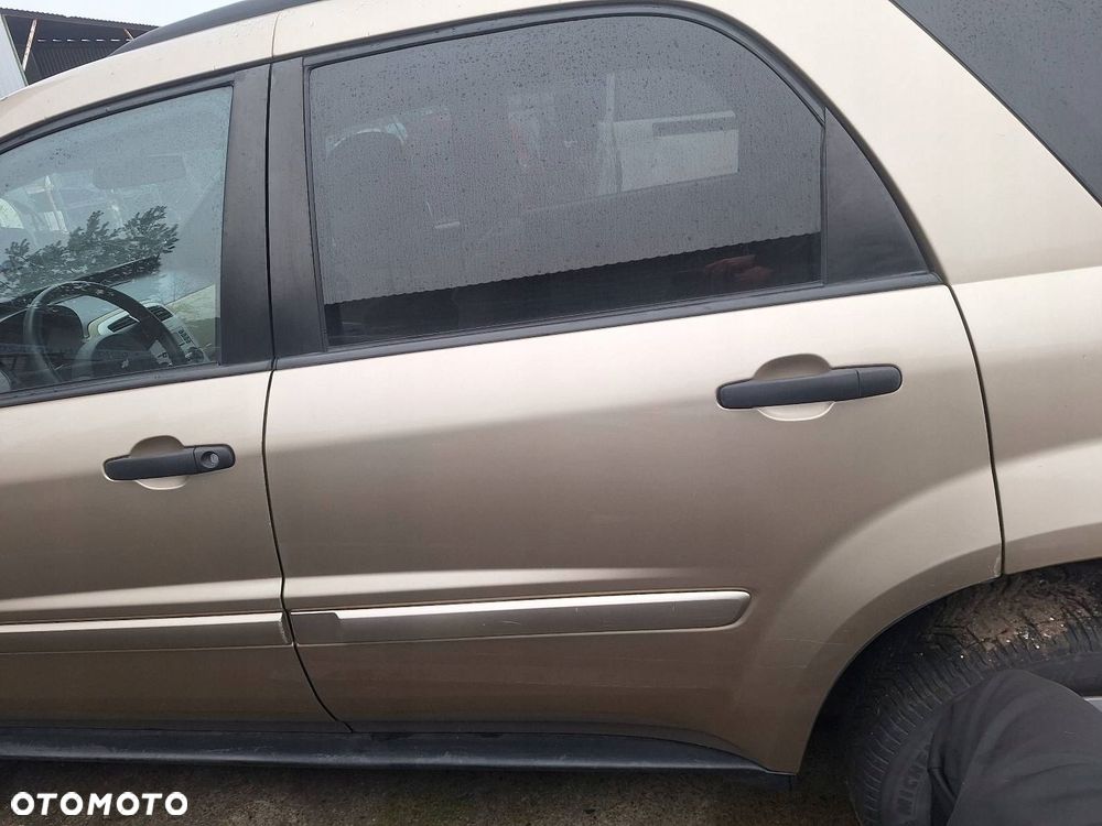 DRZWI KOMPLETNE LEWY TYŁ CHEVROLET EQUINOX I 04-09r LAK: WA231M - 1