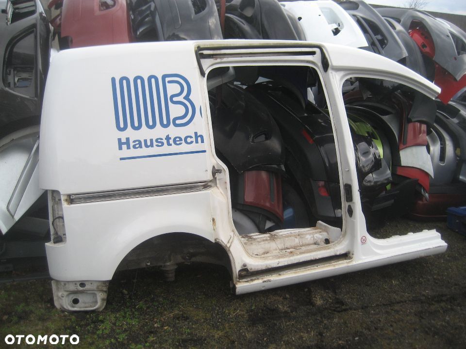 vw caddy  03-14r błotnik tył prawy krótki  kod lakieru LB9A