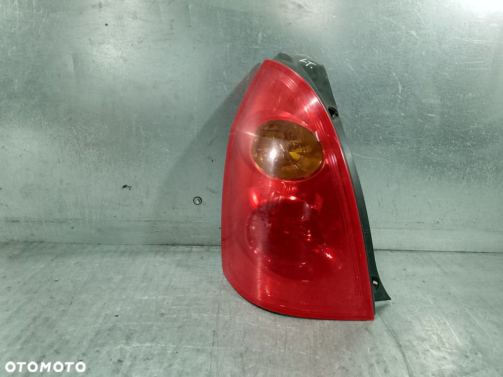 LAMPA TYLNA LEWA NISSAN PRIMERA P12 ( 03-07 ) KOMBI - 1