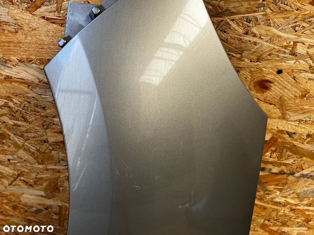 BŁOTNIK LEWY RENAULT SCENIC 3 III LIFT Kod lakieru: TEHNK - 4