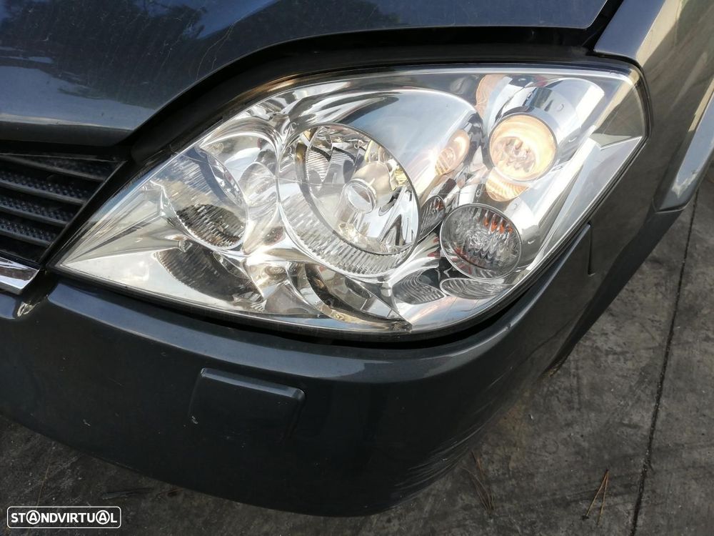 FAROL ESQUERDO NISSAN PRIMERA BERLINA P12 - 1