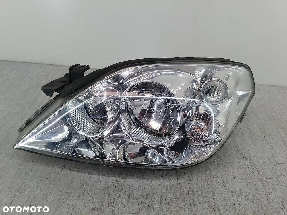 LAMPA PRZÓD LEWA NISSAN PRIMERA P12 ( 03-07 ) 215-1191L - 1