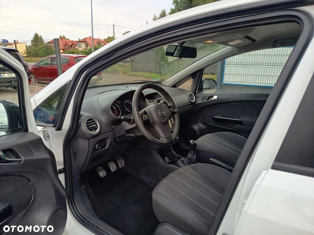 Opel Corsa 1.4 16V Active - 12
