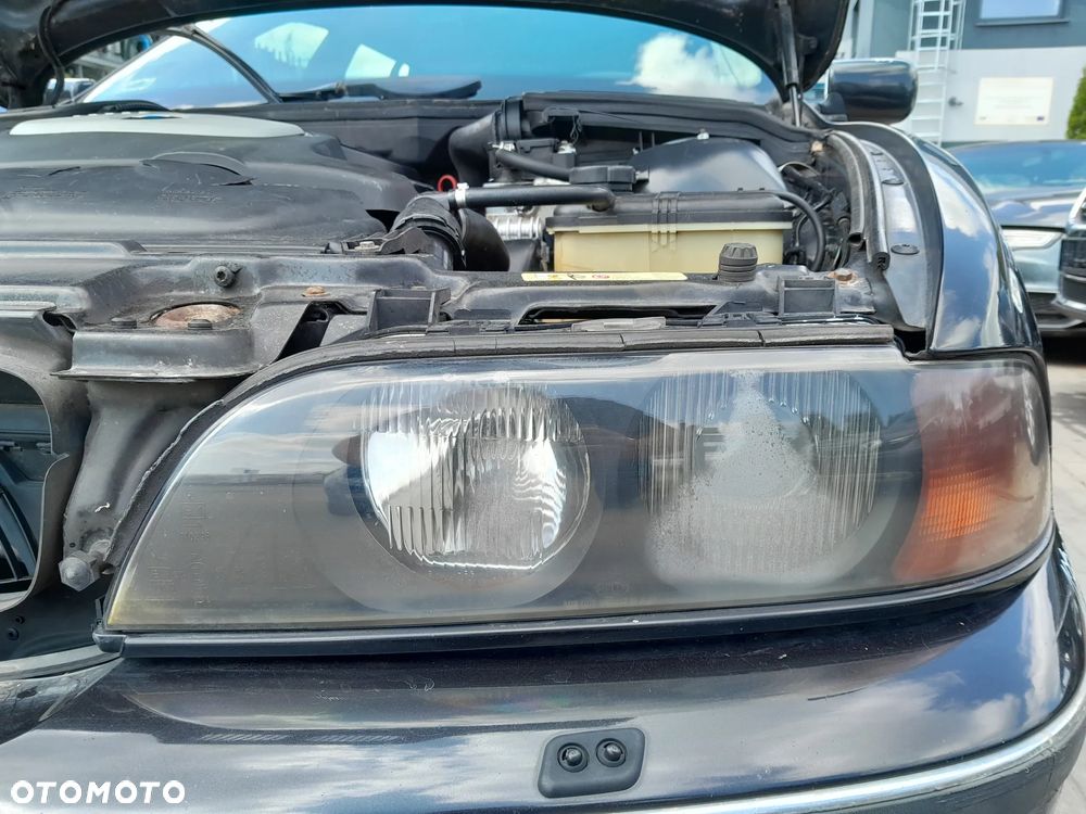 BMW E39 REFLEKTORY LAMPY PRZEDNIE KOMPLET XENON HELLA CZARNY ŚRODEK - 1
