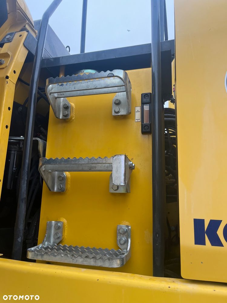 Komatsu PW180-10 - 16