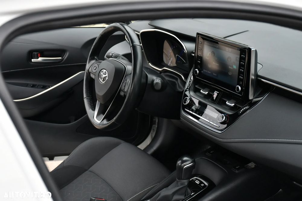 Toyota Corolla 1.8 HSD Exclusive - 32