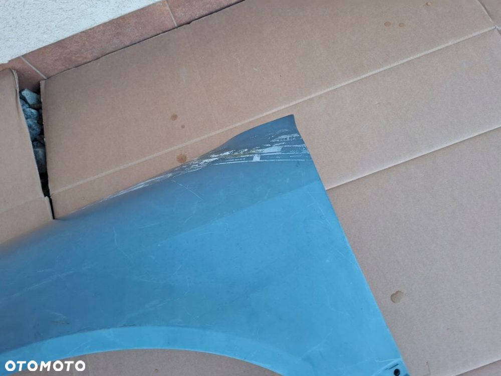 BŁOTNIK PRZEDNI VW PHAETON ORYGINAŁ NOWY