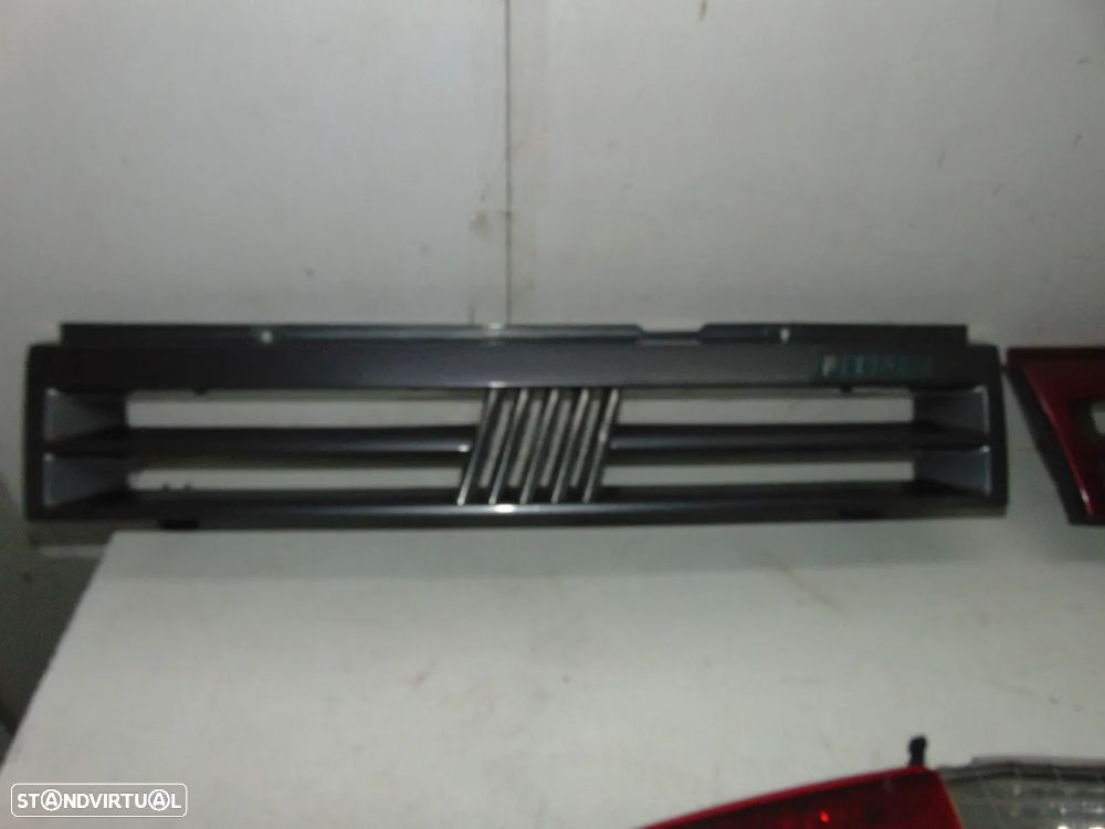 Fiat Uno grelhas/Doblo farolim - 2