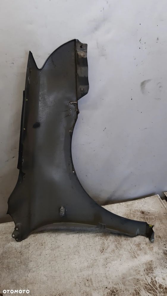 * BŁOTNIK PRZEDNI PRZÓD LEWY TOYOTA T25 1E5 SZARY - 4