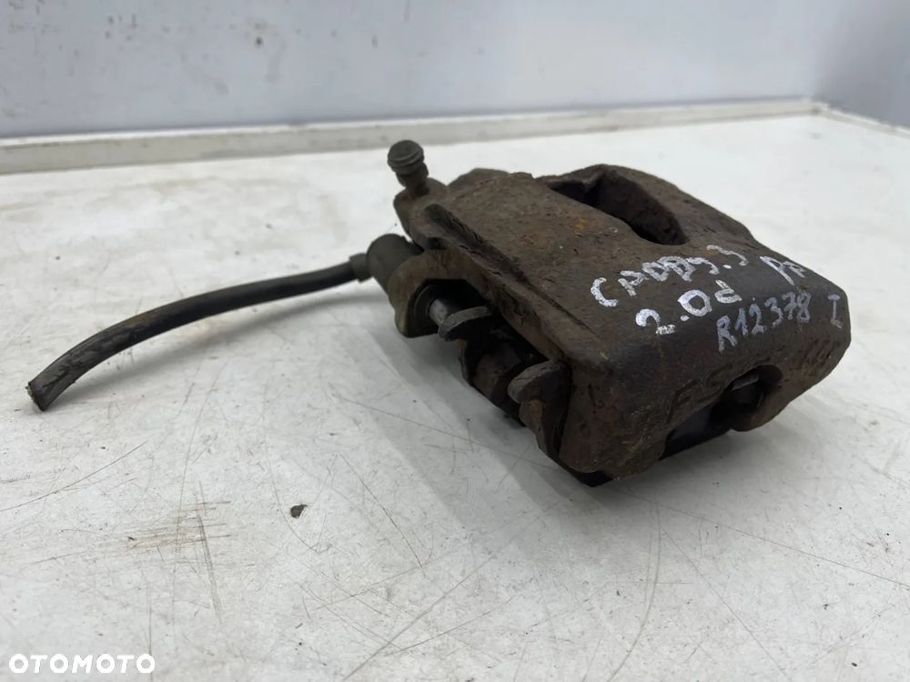 Zacisk hamulcowy VW Golf IV V VI Polo III IV Audi A3 8l 8p Leon I II Ibiza III IV Fabia I II III Octavia I II Caddy III 97-12r. prawy przedni jarzmo - 3