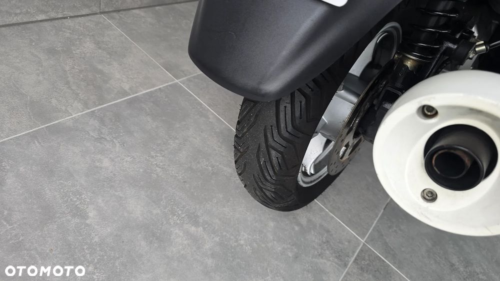 Suzuki Burgman - 26