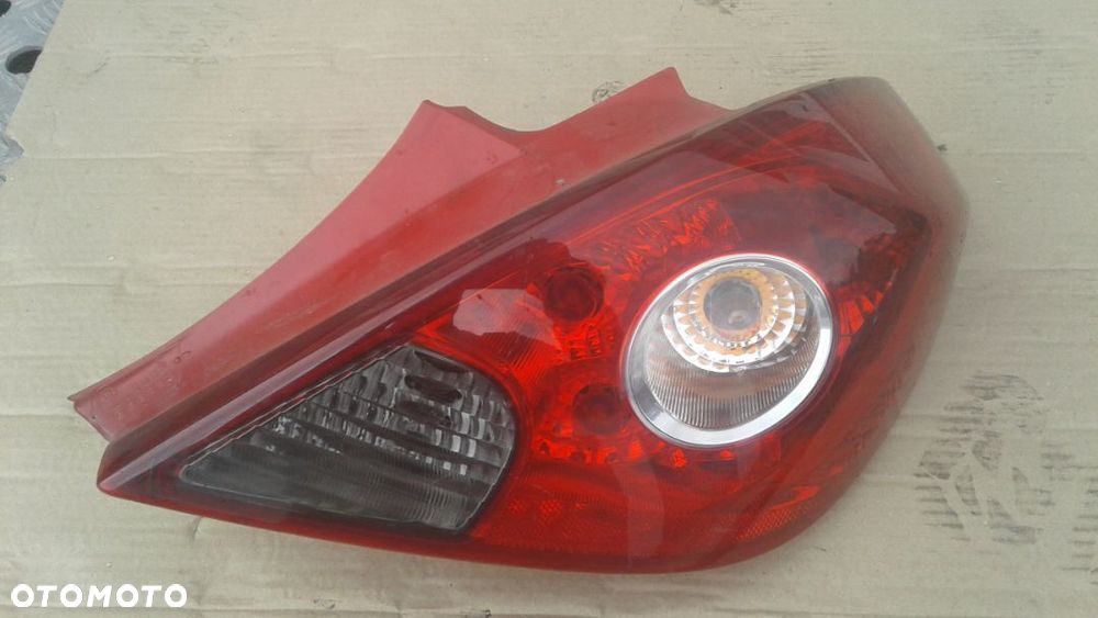 LAMPA TYLNA PRAWA OPEL CORSA D 3D - 1