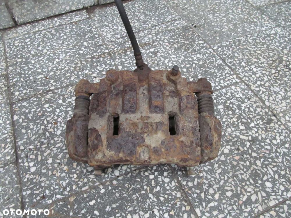 ISUZU N35 N GRAFTER NPR L ZACISK HAMULCOWY TYL PRAWY 07-18 - 1