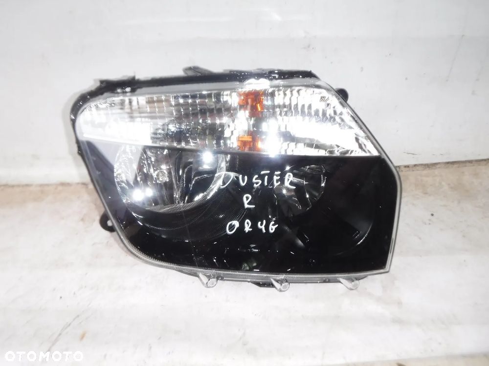 dacia duster 1 lampa przód prawa nowa oryginał przednia - 1
