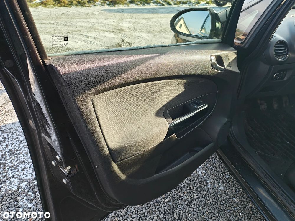 Opel Corsa 1.2 16V Enjoy - 13