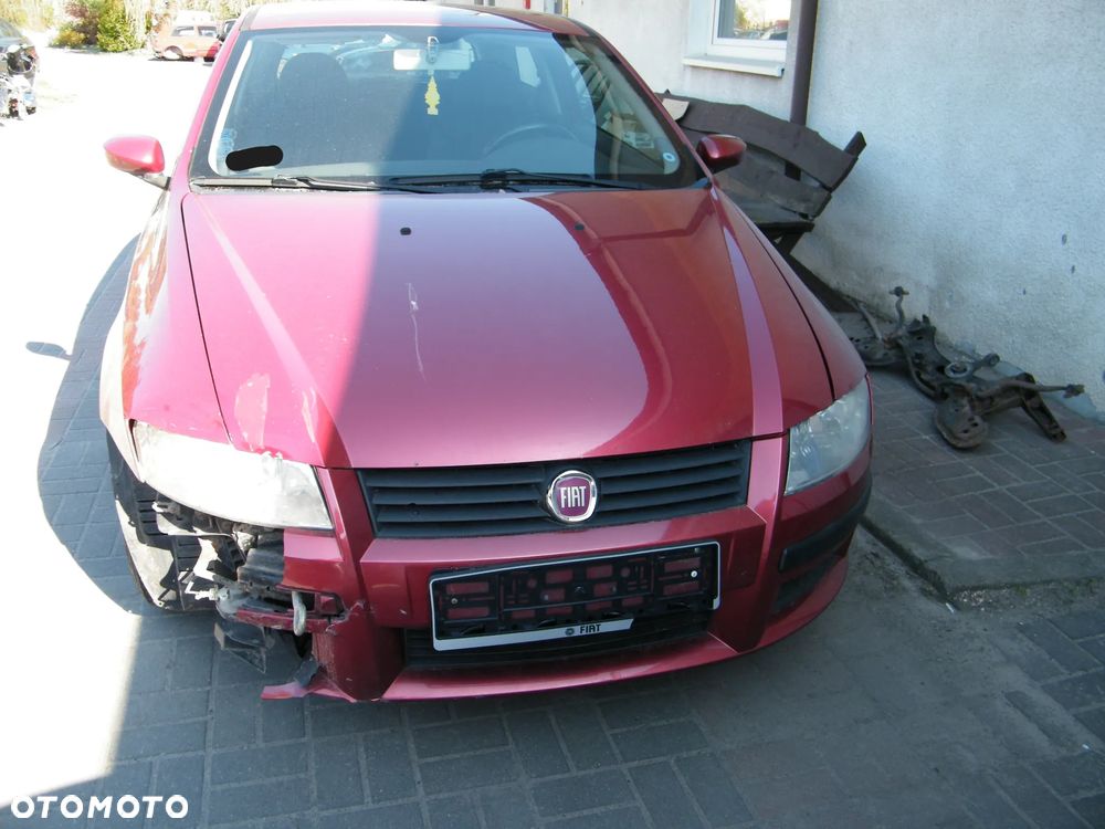 Fiat Stilo ABARTH (01-06r.) 1.4B 95KM.Silnik 843A1000 Skrzynia. Cały na części GWARANCJA !!!!  Przód Tył Zestaw Komplet Drzwi Klapa Zderzak Błotnik Maska Grill Atrapa Szyba Pas Lampa Lusterko Boczki Fotel Kanapa Kokpit Deska Rozdzielcza Przełącznik Włącznik Sterownik Przewody Wiązka Instalacja Moduł Komputer Czujnik Listwa Pompa Alternator Wtryski Głowica Rozrusznik Kompresor Sprzęgło Dwumas Silnik Skrzynia ABS Klimatyzacji Paliwa Wspomagania Kolektor Turbina Przepustnica Zawór Chłodnica Koło Hak Belka Sanki Zawieszenie Mcpherson Półoś Amortyzator Wydech Tłumik Zacisk Most - 2