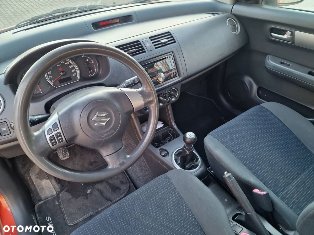 Suzuki Swift 1.3 Club - 12