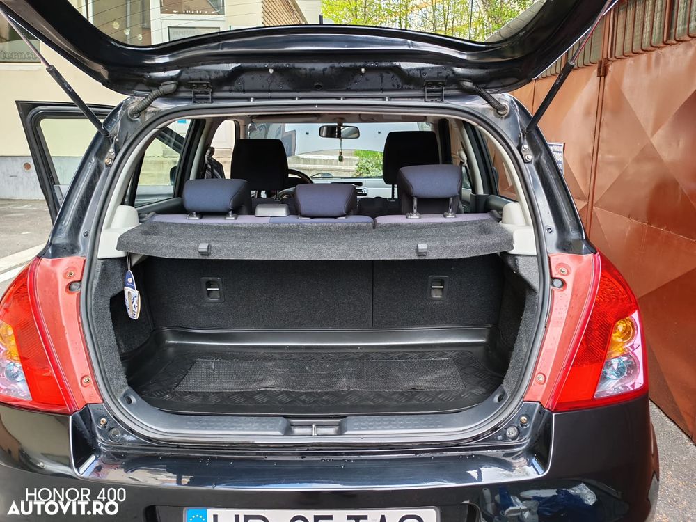 Suzuki Swift 1.3 GLX - 13