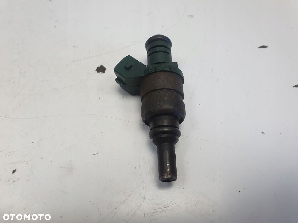WTRYSKIWACZ Kia Rio I 1.3 8V _ wtrysk 0K30C13250 - 1