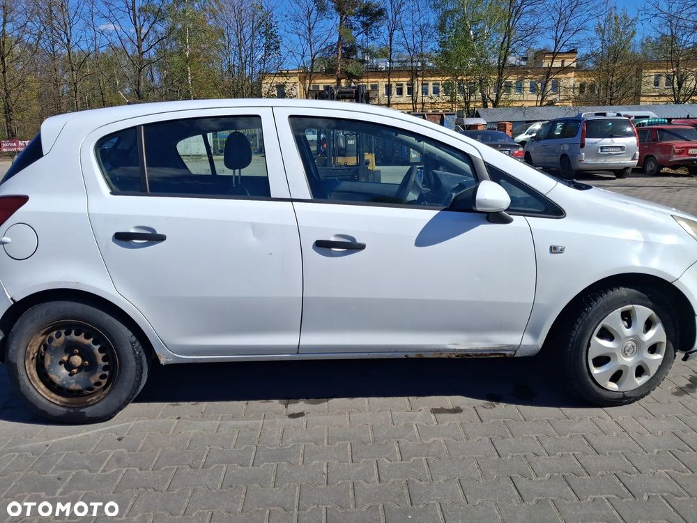 Opel Corsa D 3 silnik kompletny 1.3 CDTI diesel skrzynia biegów F17 W394 drzwi klapa zderzak błotnik kolor biały Y474 sprzęgło szyba deska wyświatlacz pas fotel podsufitka alternator maglownica pompa sterownik panel sterownik mcperson wahacz zwrotnica belka sanki przewód wąż wiązka poduszka lampa reflektor zamek zacisk radio stacyjka boczek obudowa osłona tłumik wydech kolektor wtrysk czujnik NA CZĘŚCI - 4
