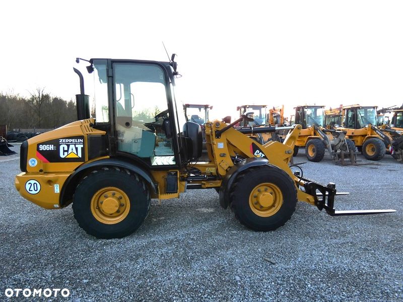 Caterpillar CAT 906H2 Z Niemiec / Ładny Stan / 5.958mtg / kilka sztuk / - 5