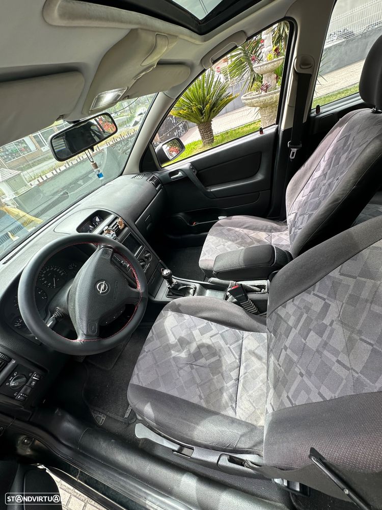 Opel Astra 1.4 Club - 9