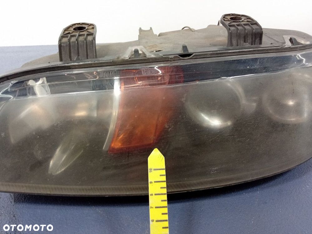 FIAT PUNTO II REFLEKTOR LEWY LAMPA EU 89101051 - 6