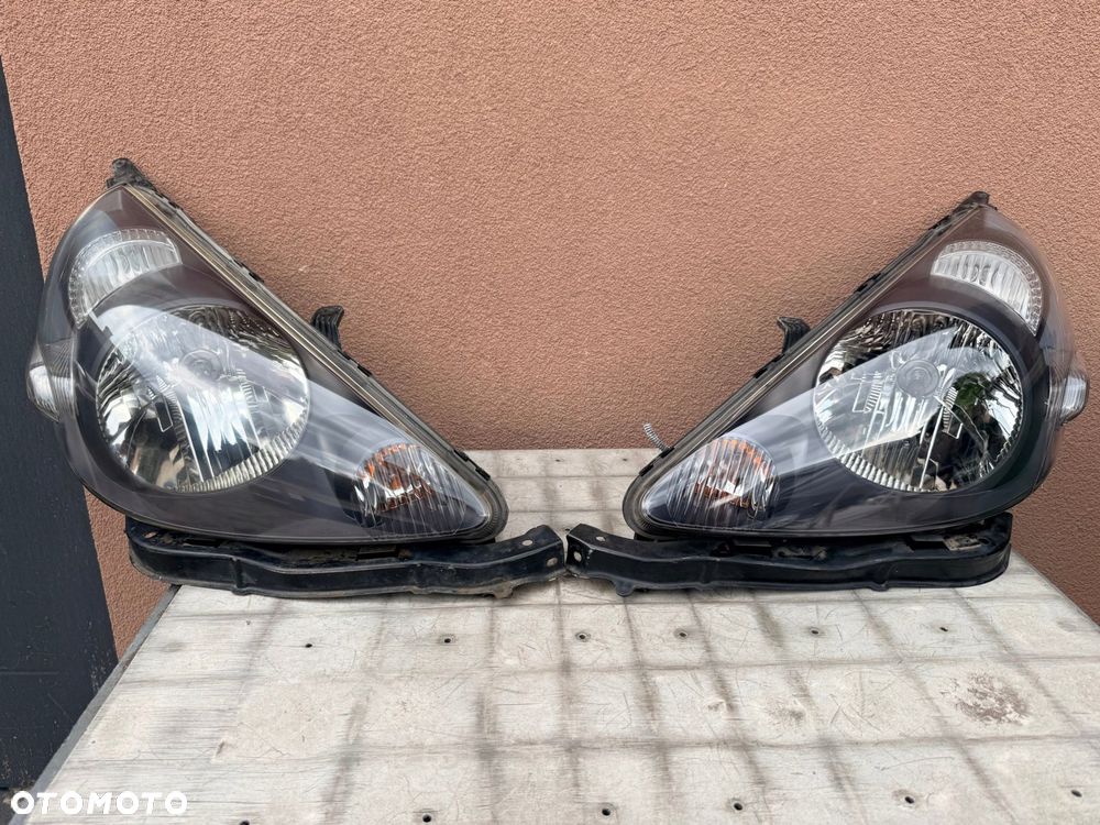 Lampa przednia HONDA JAZZ II KOMPLET EUROPA ORYGINALNE + ŚLIZGI - 1