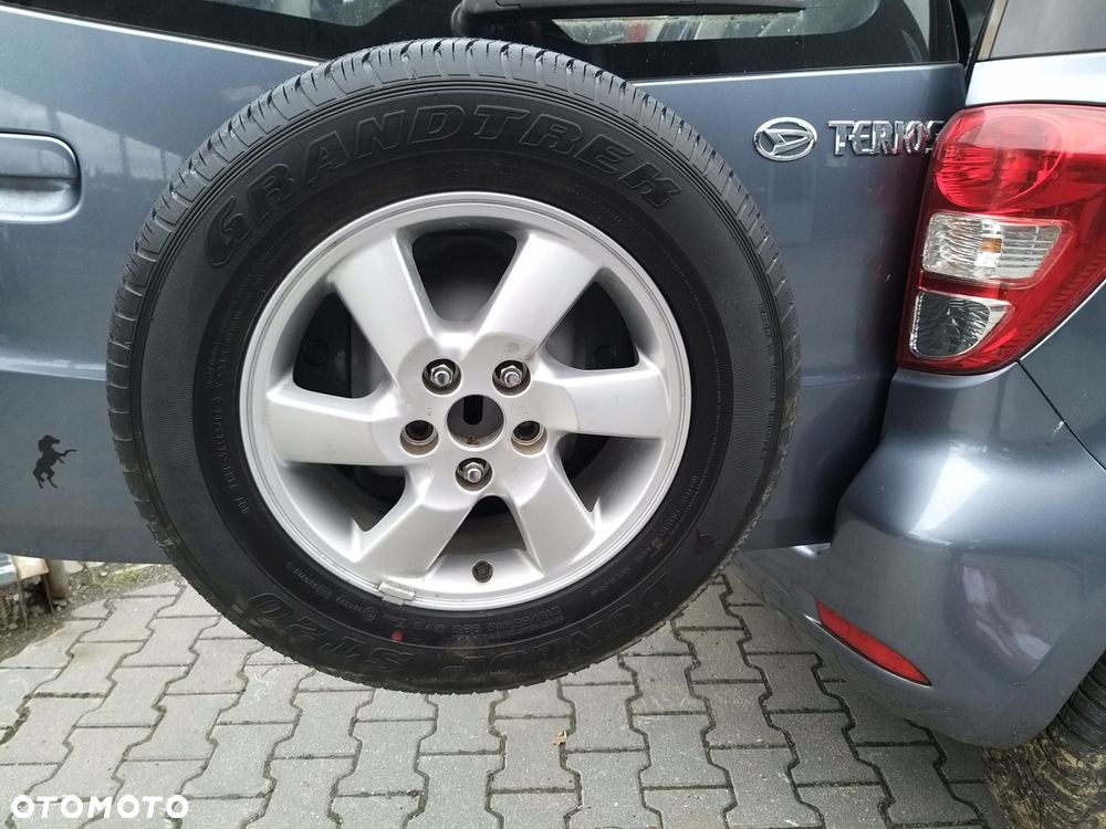 daihatsu terios ii 06r- koło zapasowe dojazdowe pokrowiec komplet mocowanie - 2