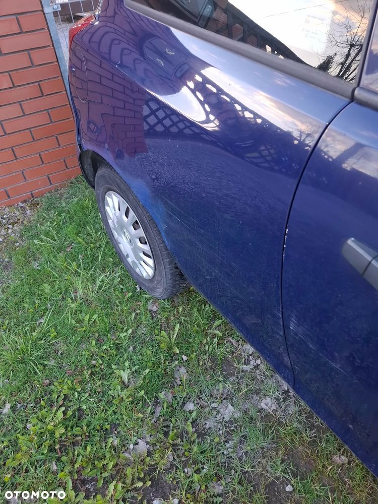 Opel Corsa 1.2 16V Enjoy - 12