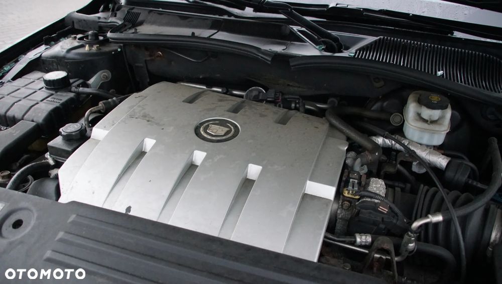 Auto na części - Cadillac DTS 4.6 V8 295 KM LD8 2008R Silnik Skrzynia Drzwi Zderzak Błotnik Lampa Lusterko Szyba Klapa Deska Kokpit Sterownik Moduł Czujnik Licznik Wyświetlacz Kierownica Panel - 19