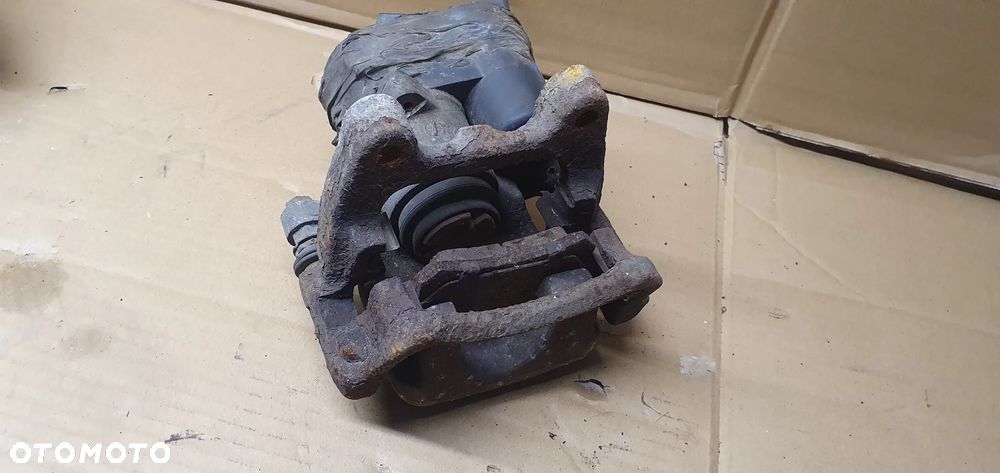Zacisk hamulcowy prawy tył tylny prawy VW Passat B6 - 6