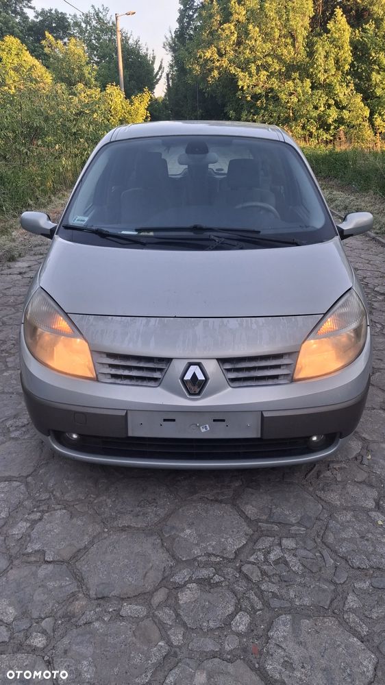 Na części Renault Scenic II silnik 1.6 16v K4M782 lakier MV632 skrzynia maska zderzak drzwi klapa szyba fotel kanapa lusterko lampa deska GWARANCJA !!! Przód Tył Zestaw Komplet Drzwi Klapa Zderzak Błotnik Maska Grill Atrapa Szyba Pas Lampa Lusterko Boczki Fotel Kanapa Kokpit Deska Rozdzielcza Przełącznik Włącznik Sterownik Przewody Wiązka Instalacja Moduł Komputer Czujnik Listwa Pompa Alternator Wtryski Głowica Rozrusznik Kompresor Sprzęgło Dwumas Silnik  Skrzynia ABS Klimatyzacji Paliwa Wspomagania Kolektor Turbina Przepustnica Zawór Chłodnica Koło Hak Belka Sanki Zawieszenie Mcpherson Półoś Amortyzator Wydech Tłumik Zacisk - 7