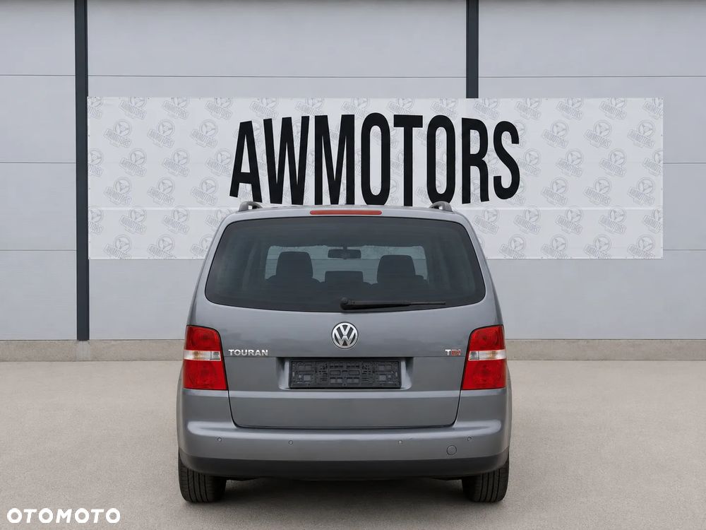 VOLKSWAGEN TOURAN 2003 *SAMOCHÓD NA CZĘŚCI* 5660 2R / D7X  MASKA, LAMPA, DRZWI, LUSTERKO, ZDERZAK, GRILL, BŁOTNIK, KLAPA, BELKA, DESKA, FOTELE, KANAPA, ĆWIARTKA KIEROWNICA, TARCZE, ZACISKI, ZAWIESZENIE, KOMPLETNY PRZÓD, KOMPLETNY TYŁ, LICZNIK, ZEGARY, PRAWE LEWE PRZÓD TYŁ - 2