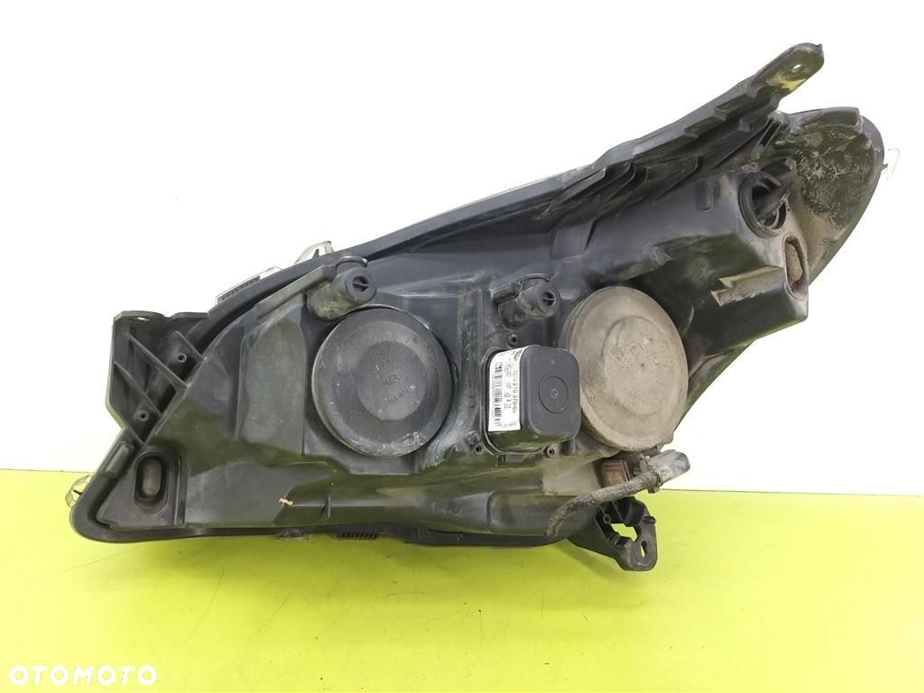 Reflektor lampa przód prawa Opel Astra III H 2004-2013 HELLA  1EG27037002 - 6